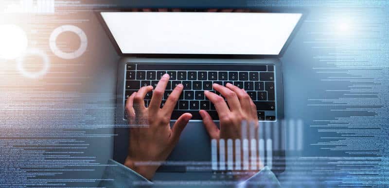 top view hands that code on a laptop